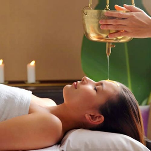 Medicated oil Shirodhara therapy